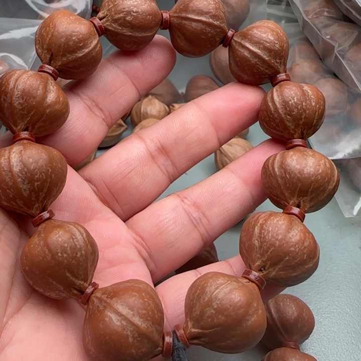 张***_手串橄榄核橄榄核原皮铁核