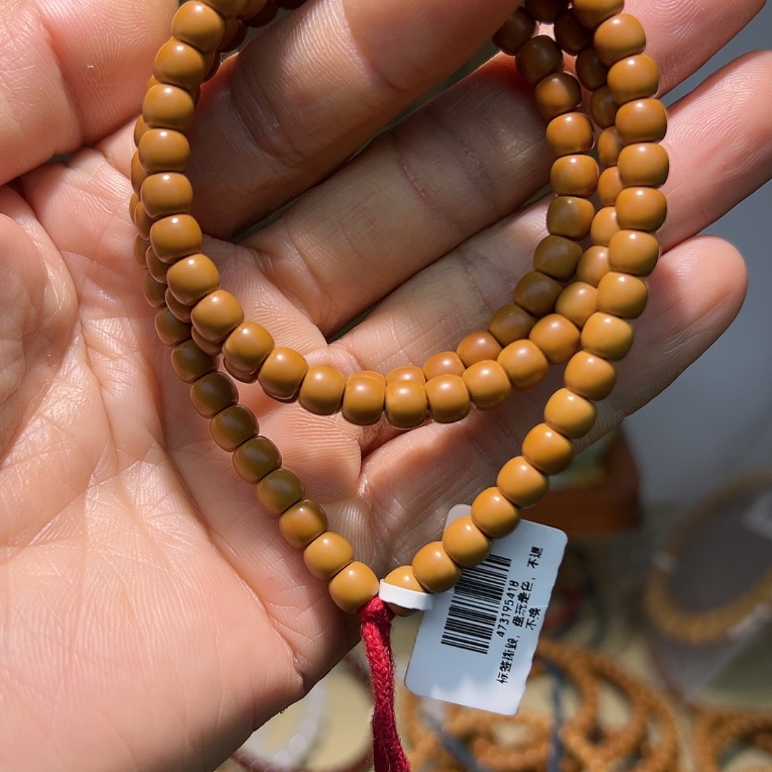 海***、手串橄榄核老挝核尖长串6.0