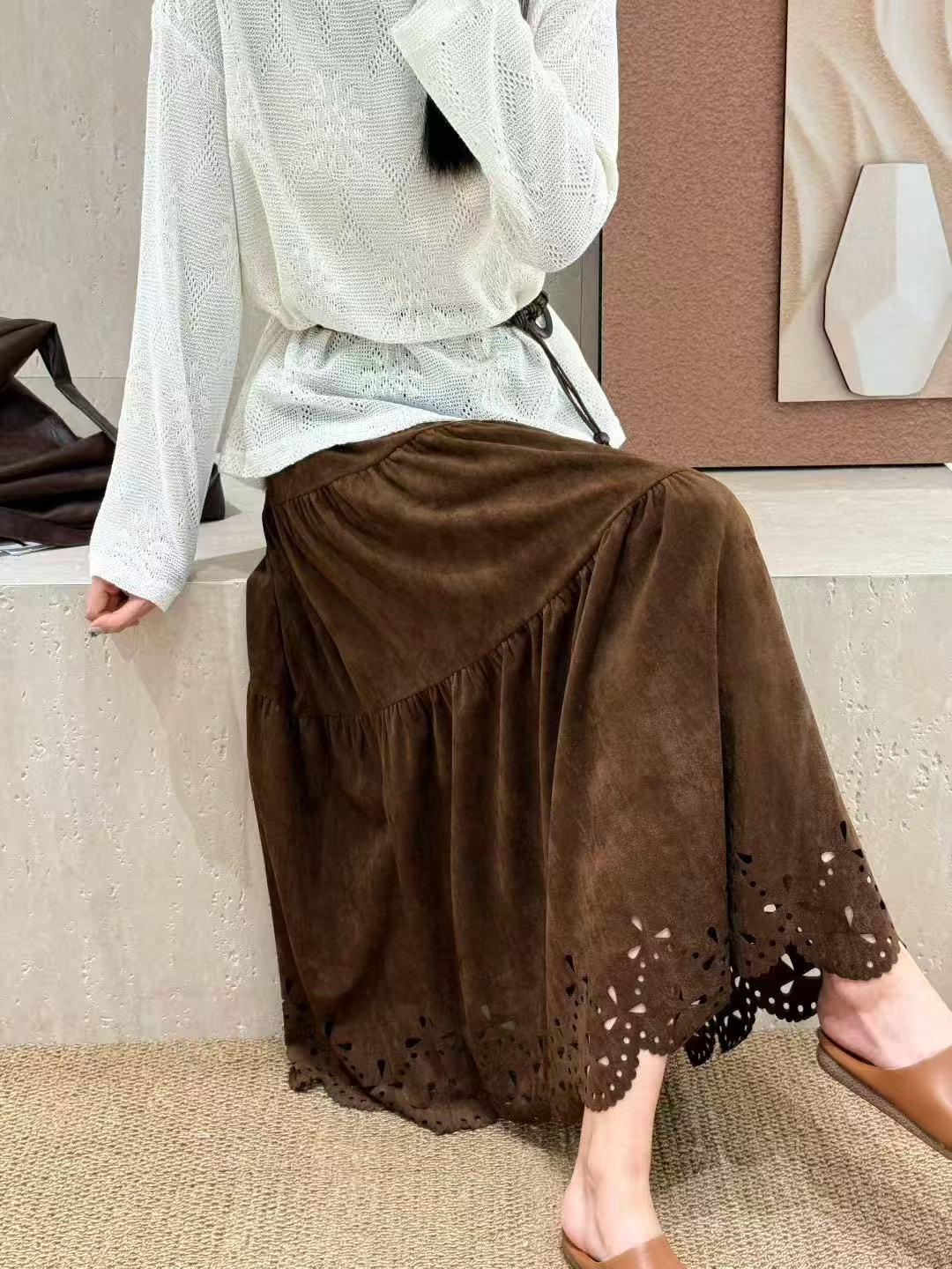 {西女专享}秋新品麂皮感镂空大摆裙