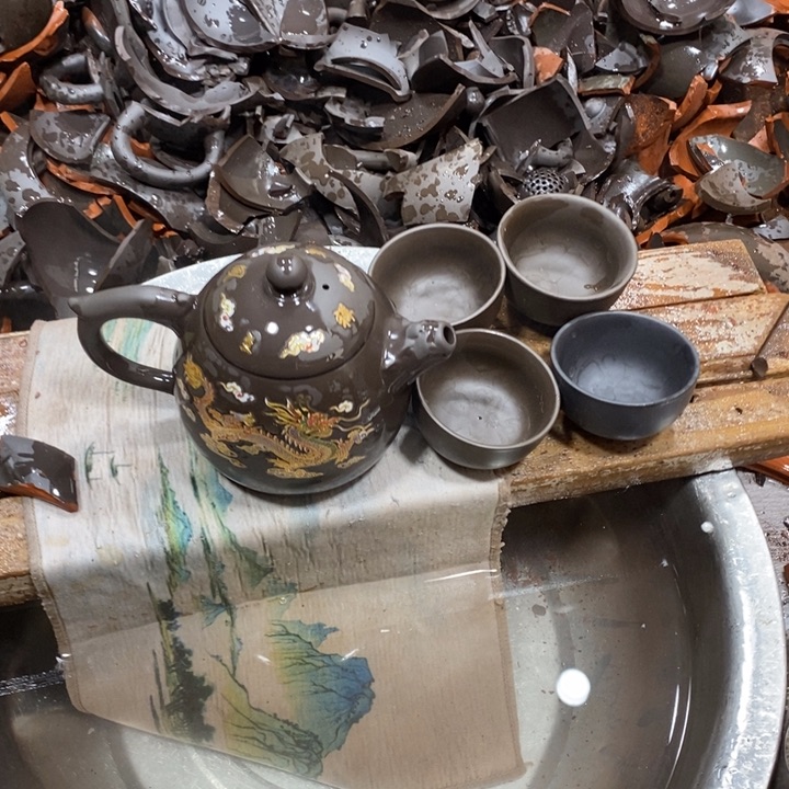 紫砂茶壶我也不知道