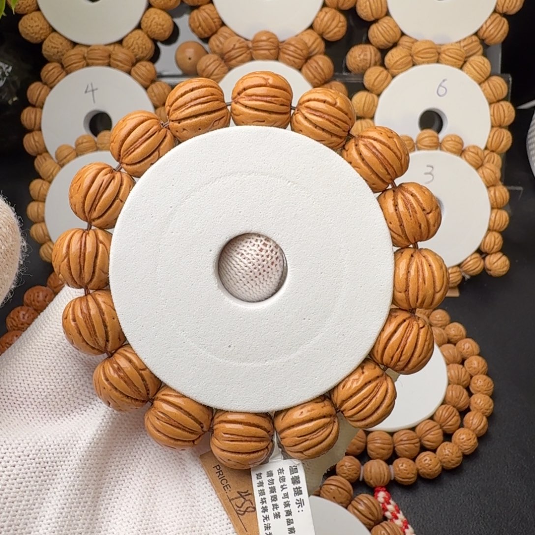 B***~桃核手串老树金丹