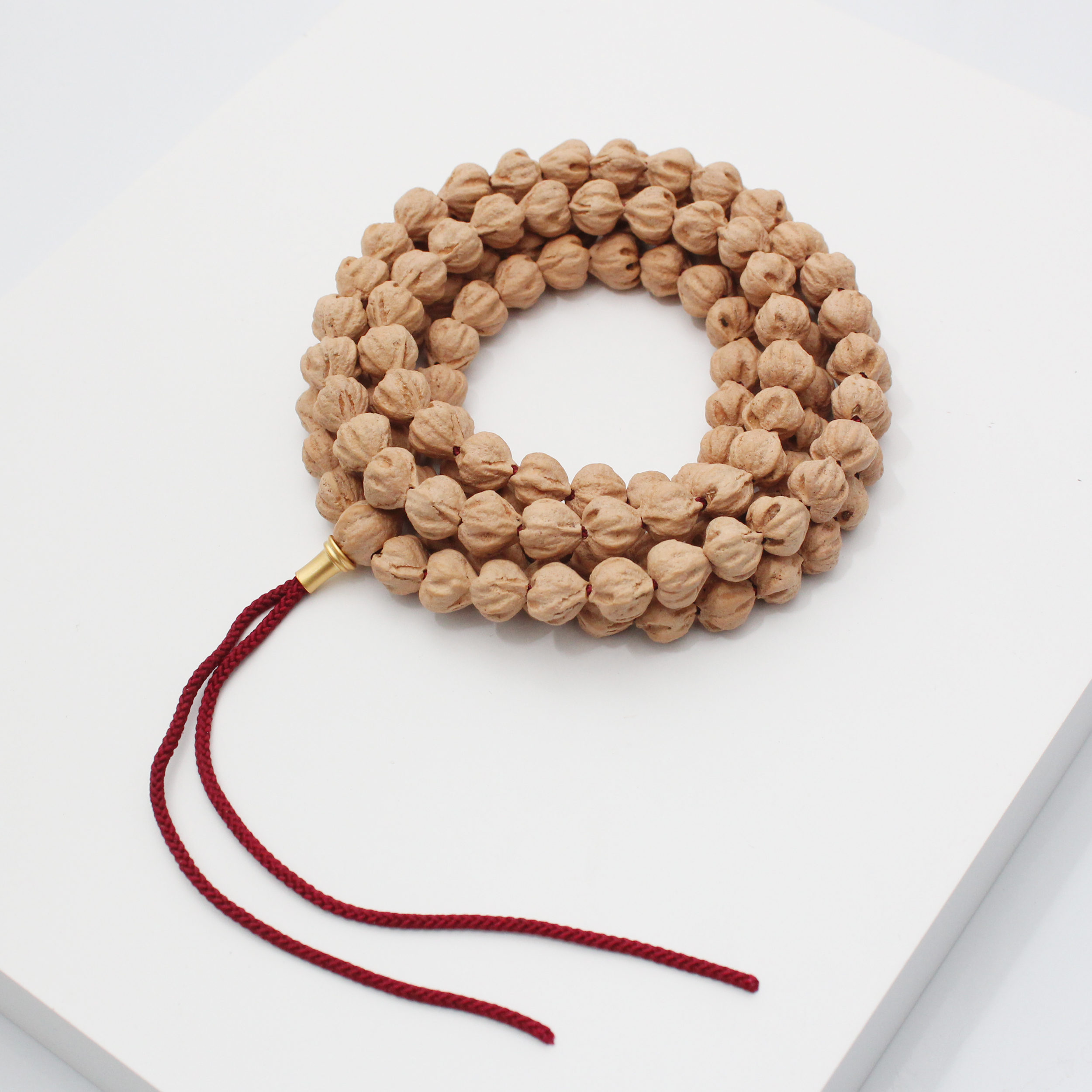 麻皮满棱桃心7-9mm莲花桩百香籽/柏香籽A058