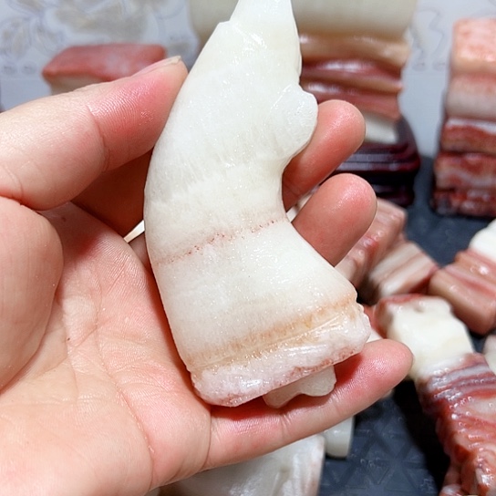 "***；石材广西柳州猪肉石摆件