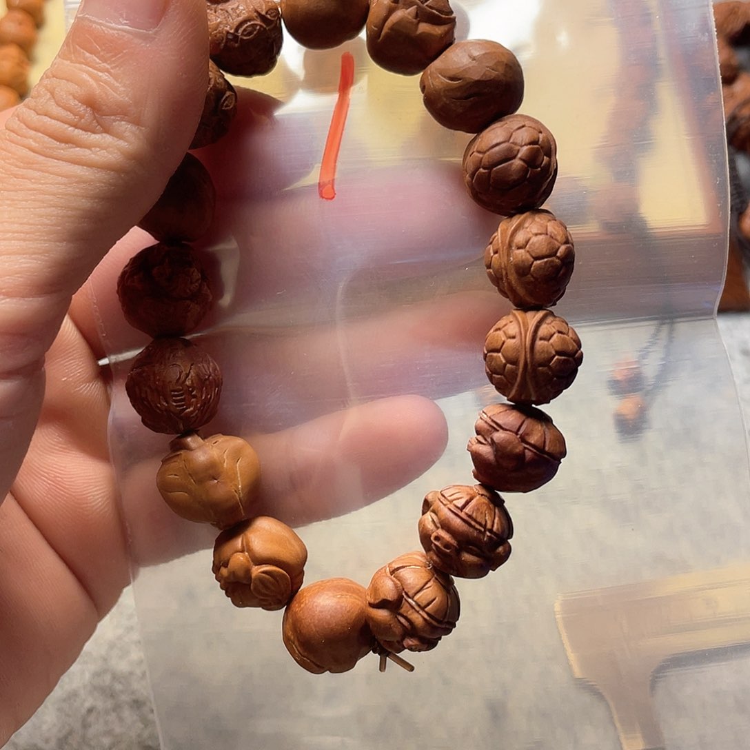 浅*歌龙纹桃核雕刻多宝（非全品）