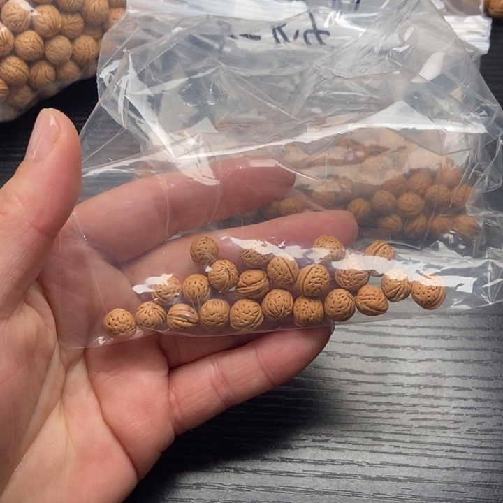 锦***李吊坠桃核散籽发货300