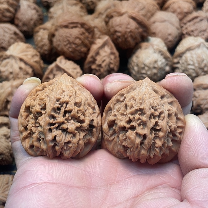 白***地文玩核桃吊坠百花山