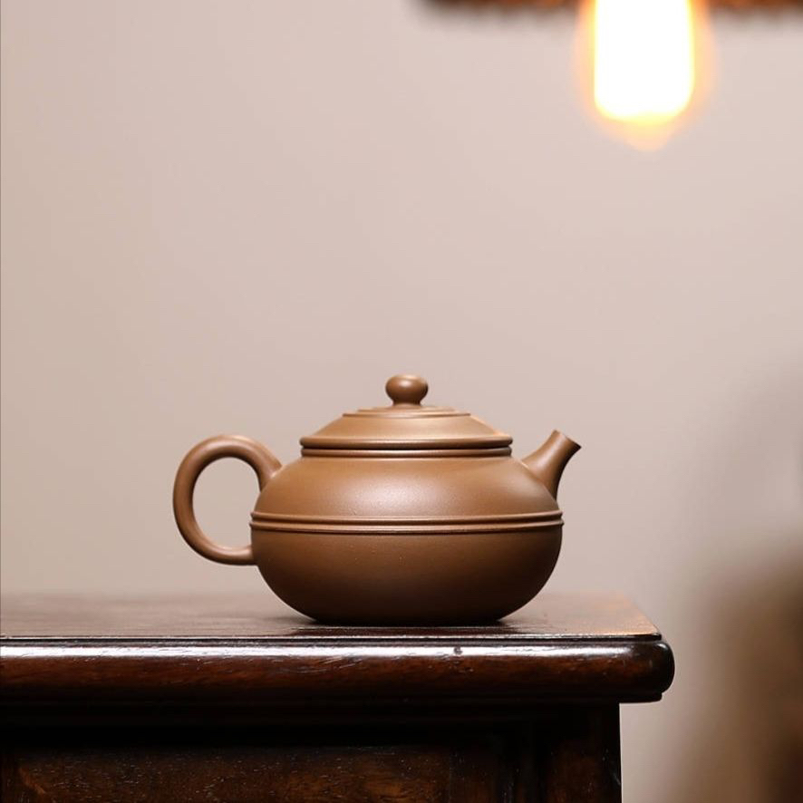 宜兴桃花泥线圆紫砂壶