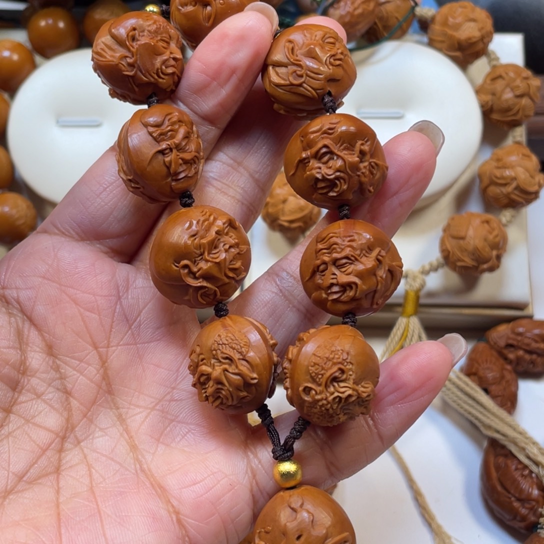 浪****乐群十八罗汉橄榄核手串