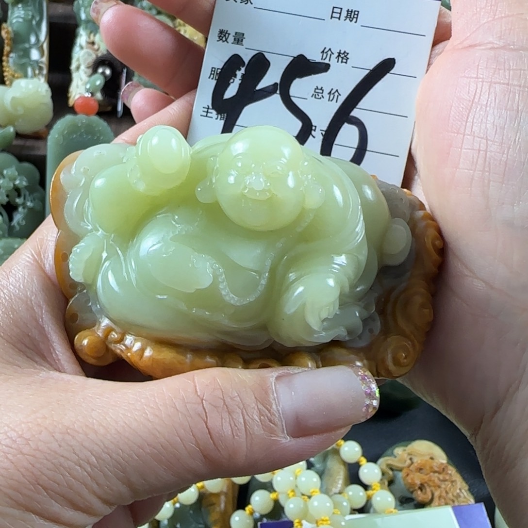 两***刘透闪石质玉未镶嵌把件