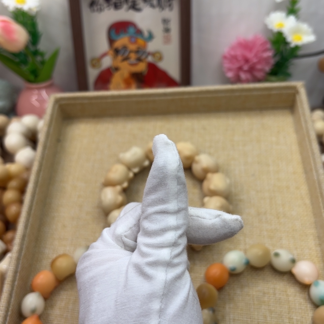 宝****吊坠菩提根/象牙果18干磨微瑕落地果糖油巧克力猫头