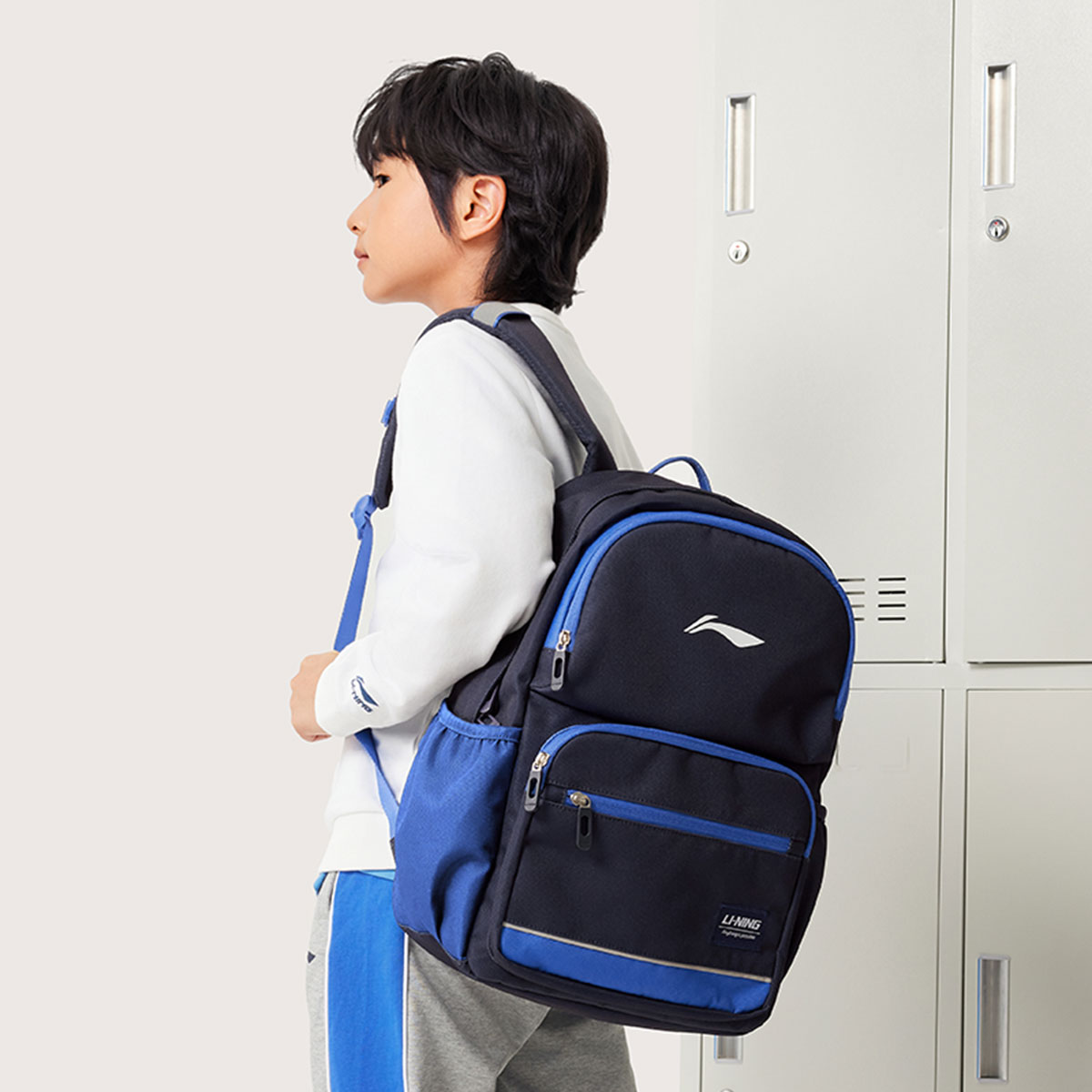 【开学季2025新品】李宁男女小大童运动生活系列反光双肩包YBSV191
