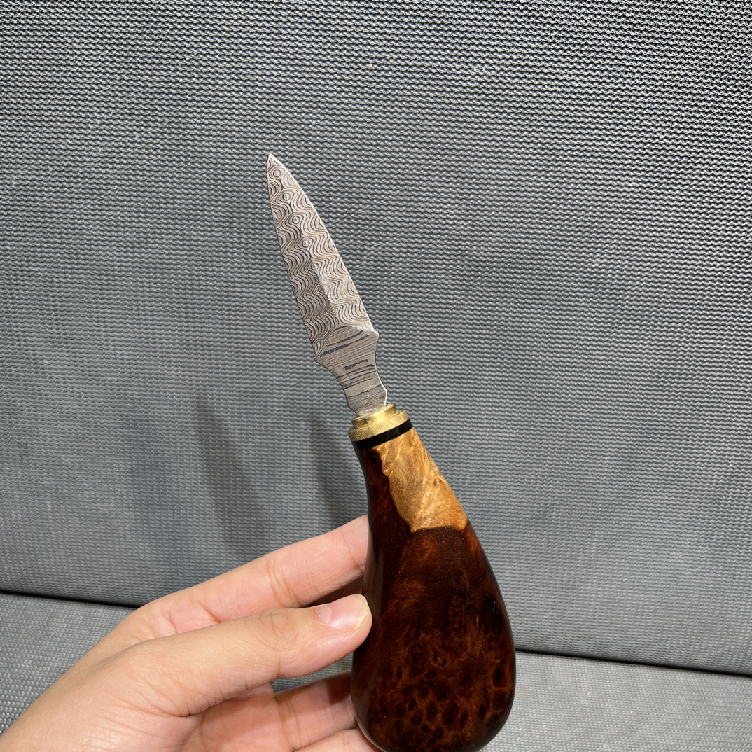 双色茶刀特价出，缅甸花梨瘤疤镶嵌紫光檀，尺寸：16/4.5/2.5