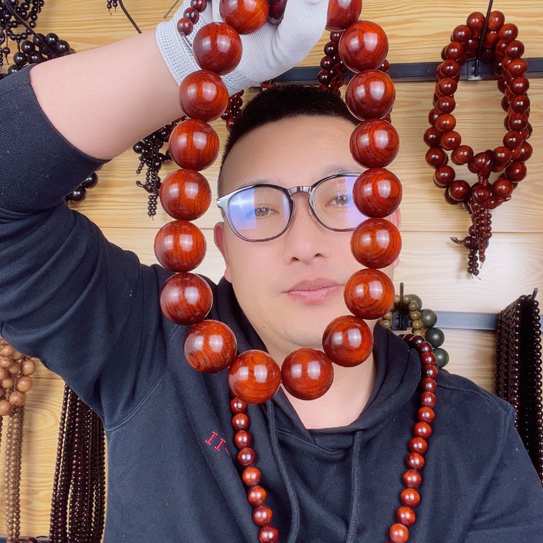 记***刻木3.9/19颗。紫檀木