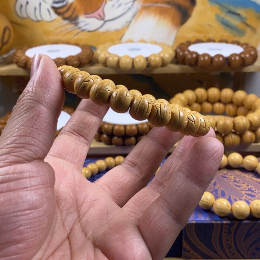 桃核手串颓**火盘锦奶油核横打