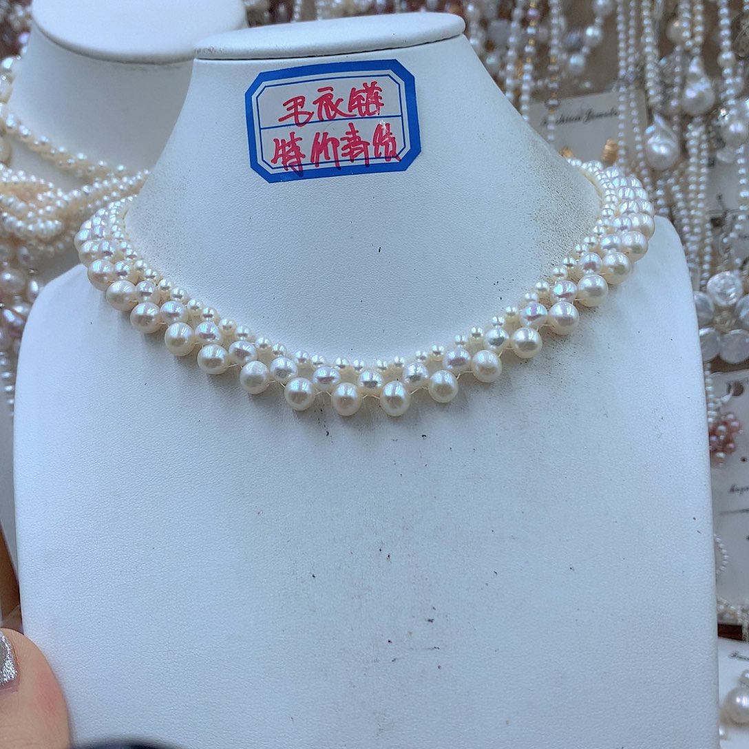 黑***子银S925镶嵌淡水珍珠耳饰