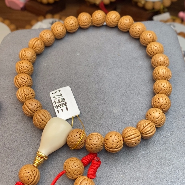 桃核手串三道筋12.5 ………….