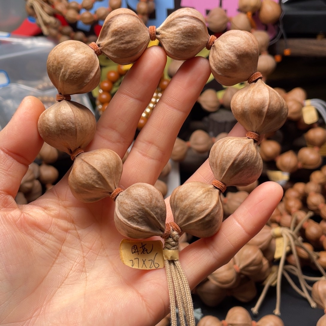 破***汁橄榄核吊坠2726四花铁核