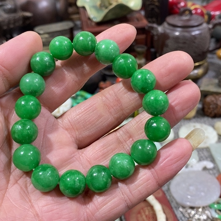 磁***菜石材手串。        