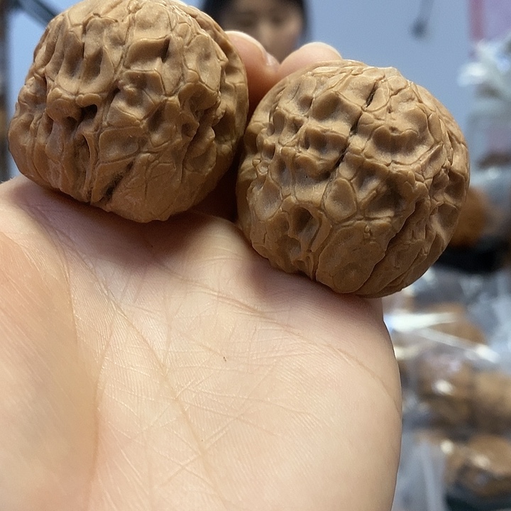 文玩核桃把件38红皮甲骨文