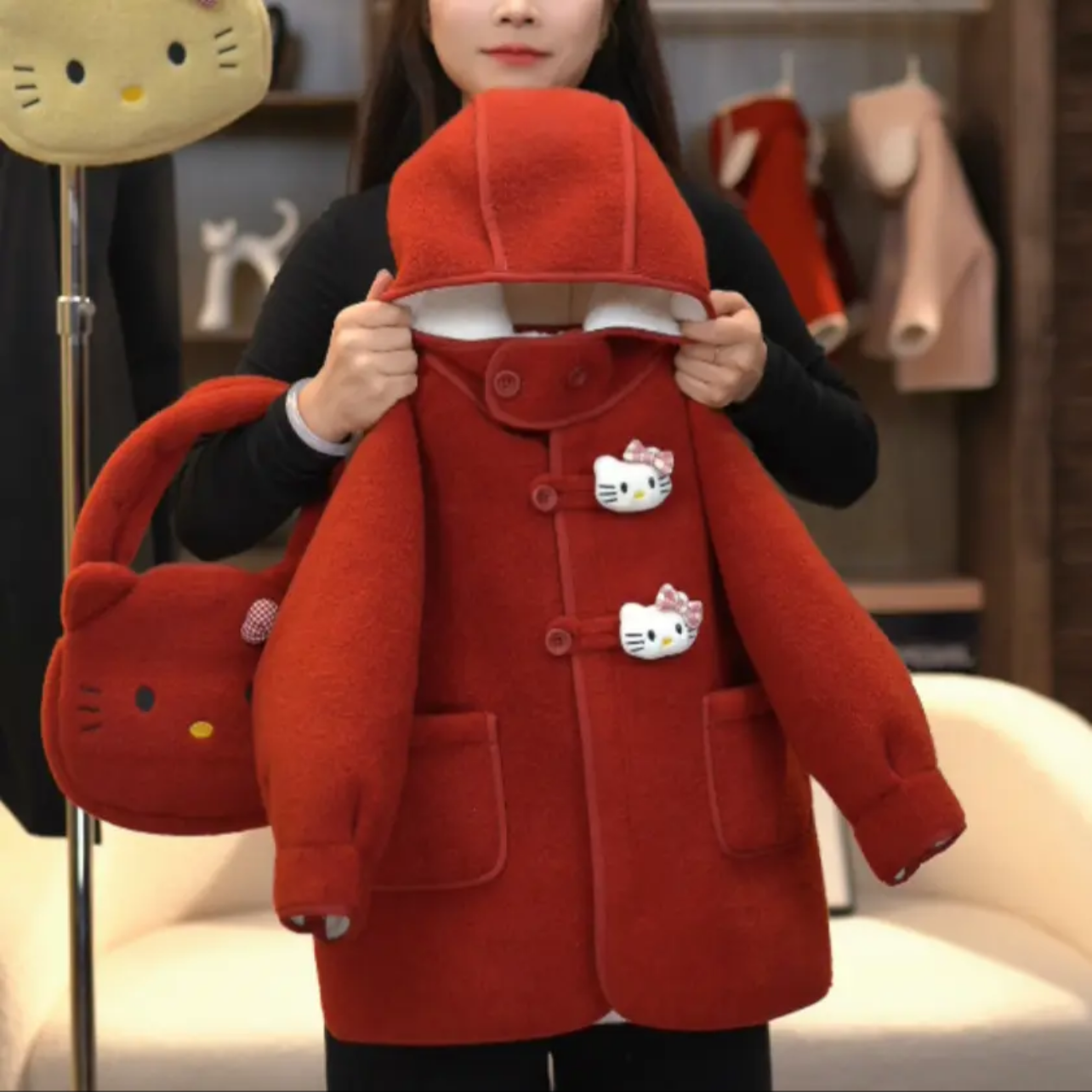 2025冬季新款女童KT猫加绒加厚连帽毛妮时尚保暖呢大衣外套