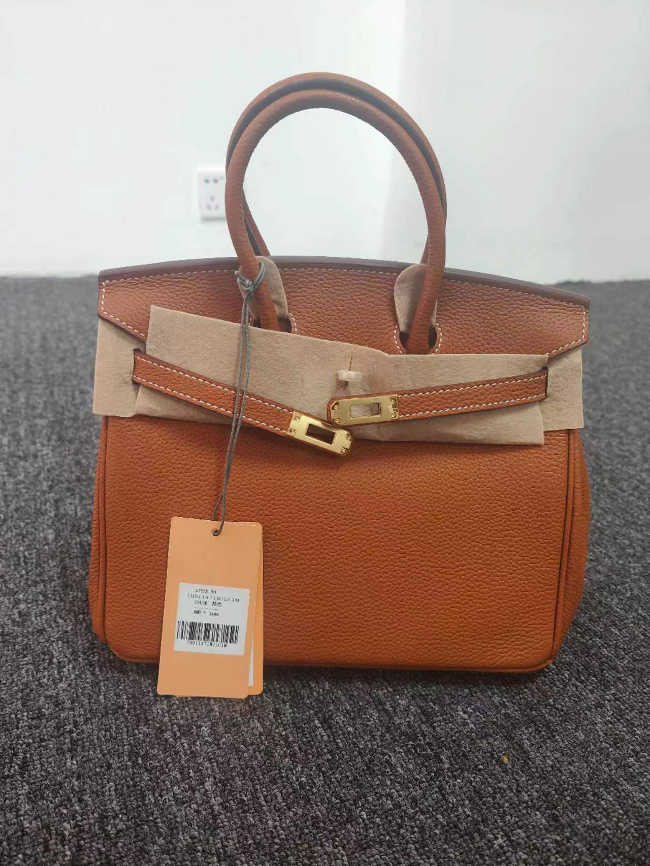 时代双鱼品牌包 手提博金包