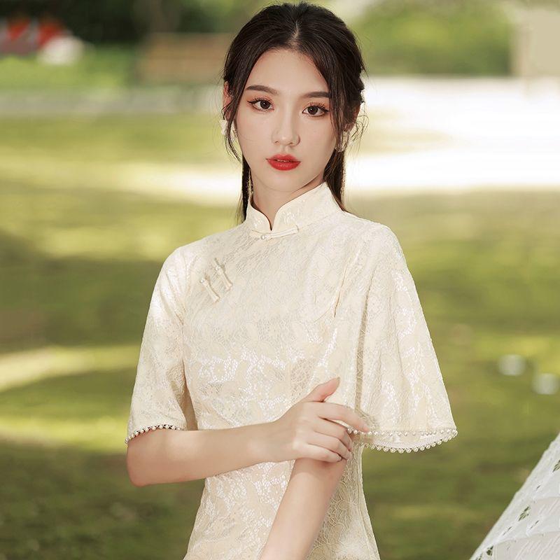 改良旗袍2025年新款夏季香槟色年轻款少女连衣裙秋复古蕾丝倒大袖