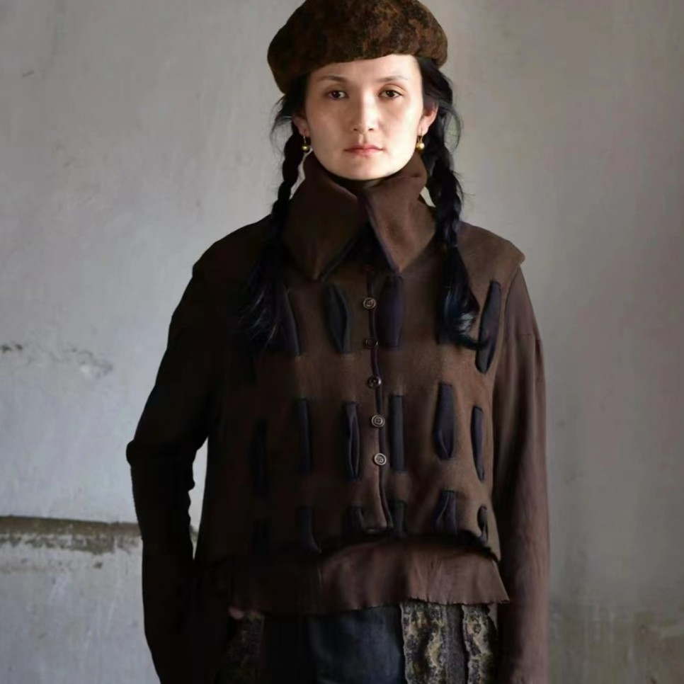 7折圆机针织马甲     左岸迷香