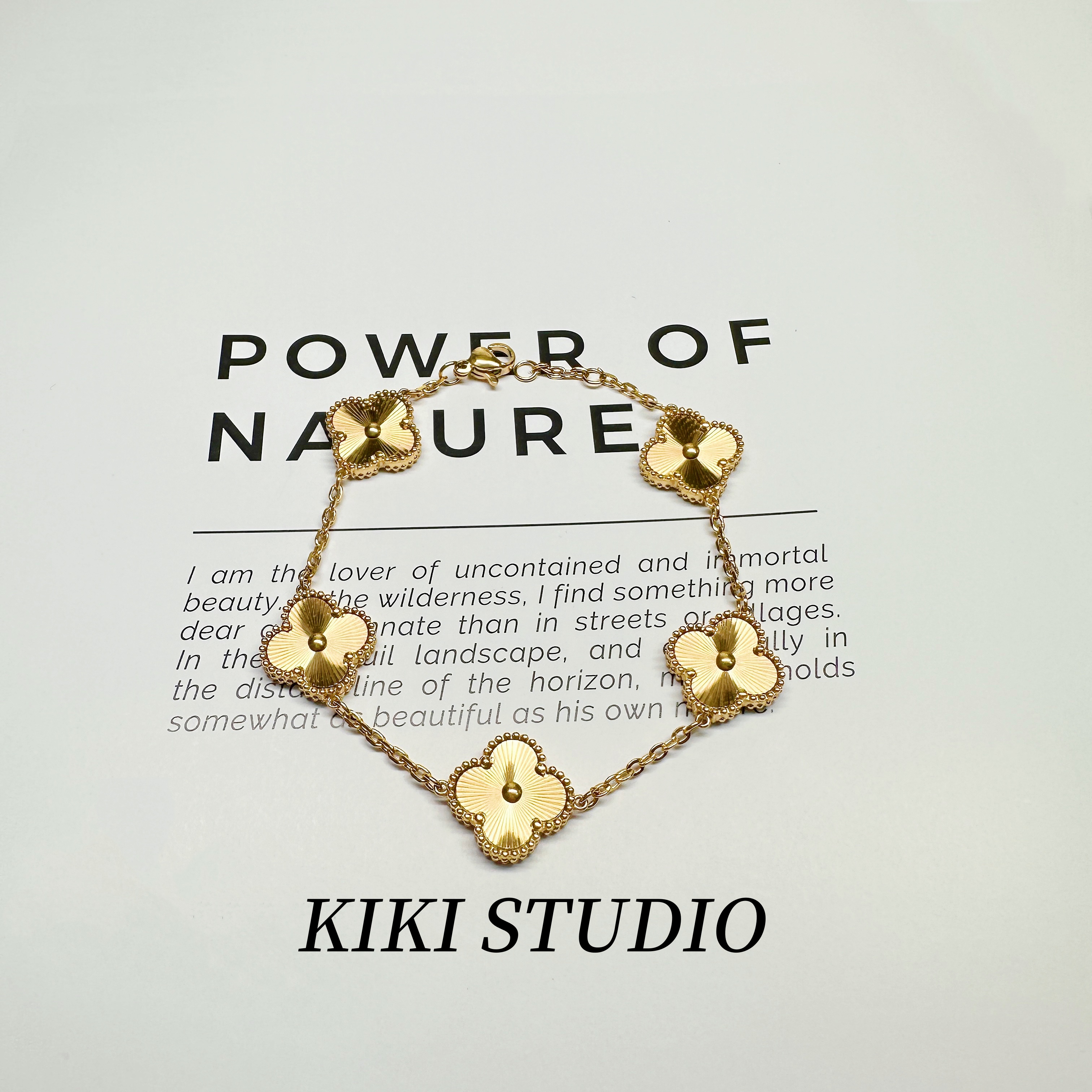 钛钢手链 时尚气质轻奢四叶花朵镭射手链