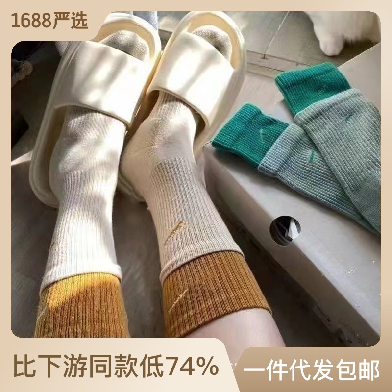 苏万耐剋斯特袜子彩色拼接中长筒运动毛巾底袜子男女情侣袜子