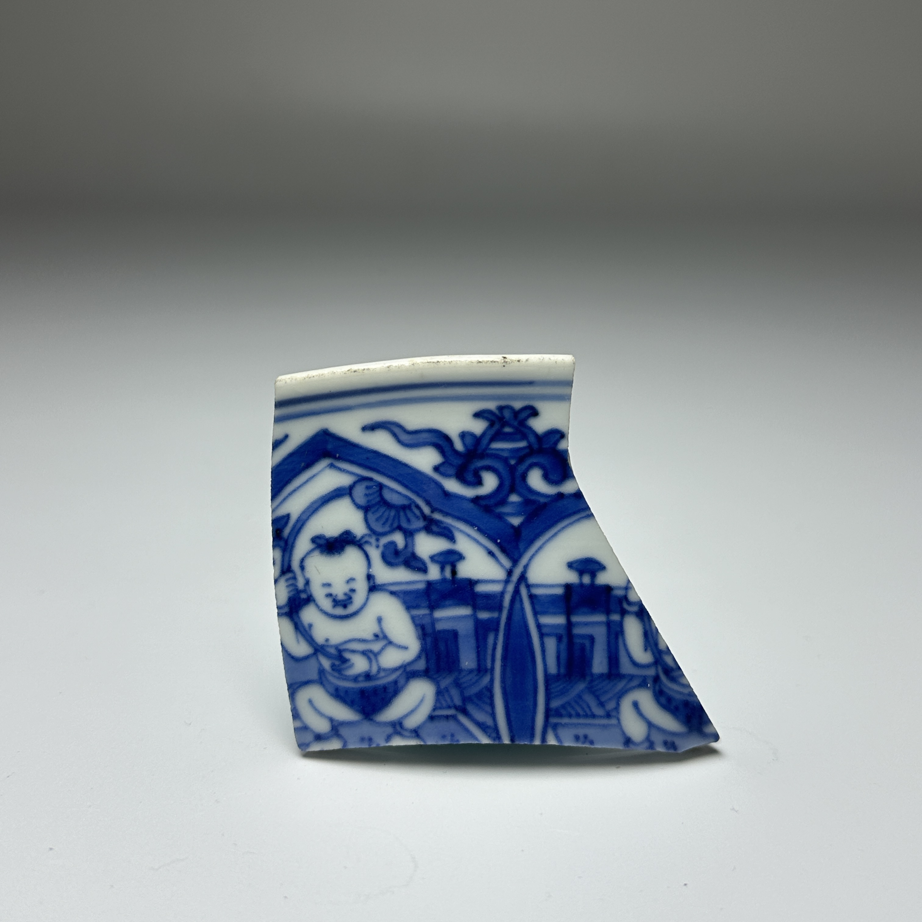 清康熙“执莲童子”浙料发色圆器标本