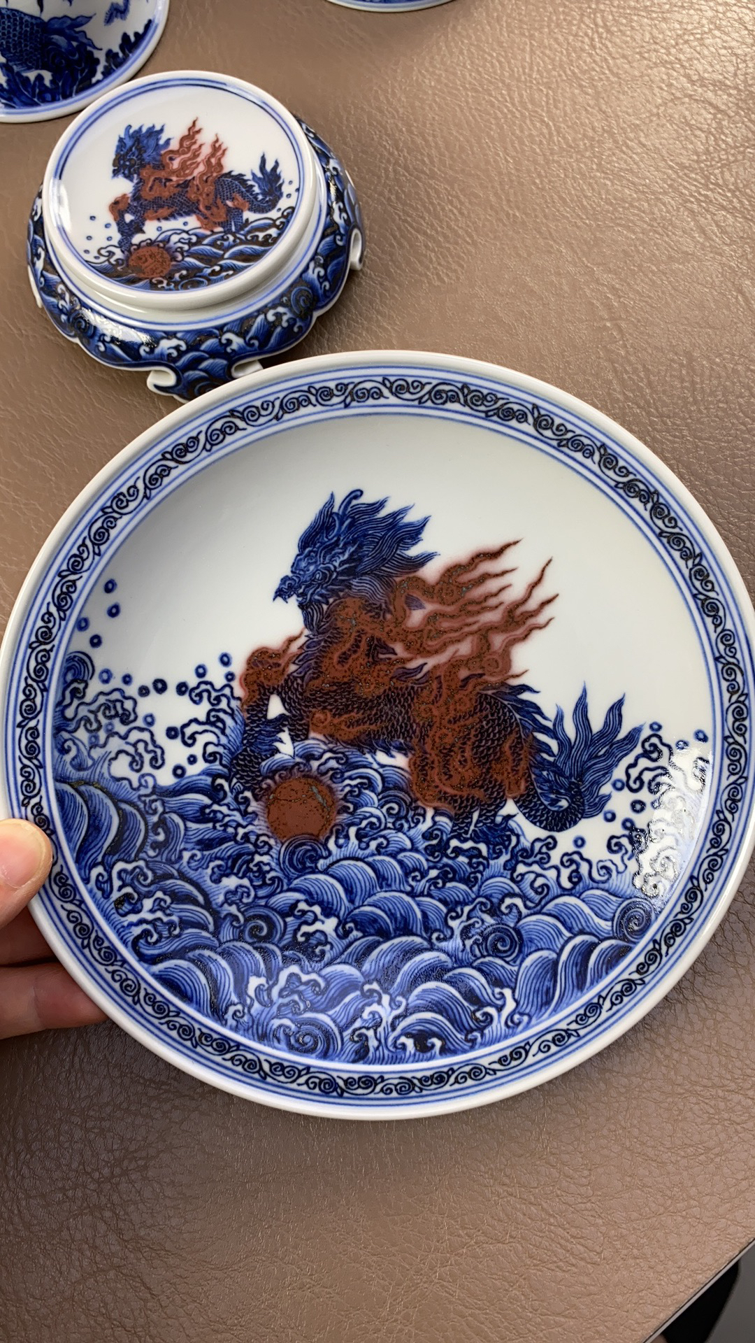 又见春风青花釉里红火麒麟壶承