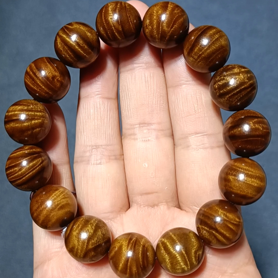 1.5闪电纹牛金丝楠木老料小叶桢楠手把玩