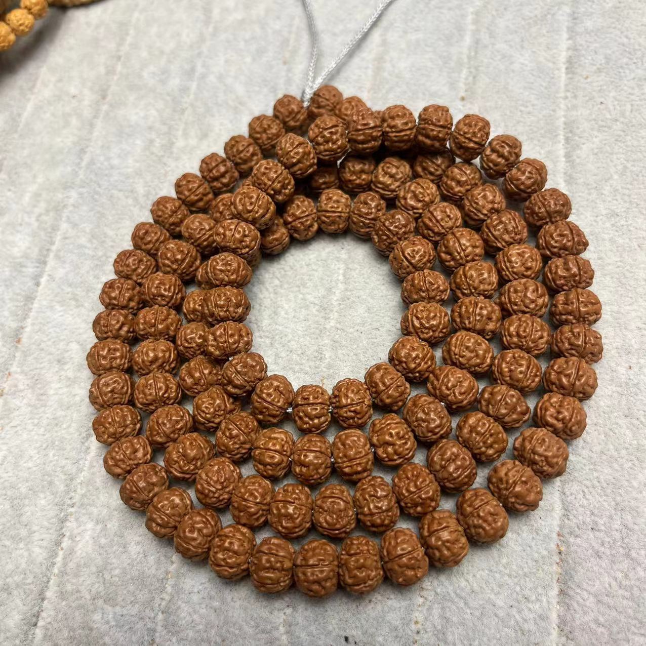 《勿里达老树王108》10mm小金刚菩提手串红皮一代母树籽