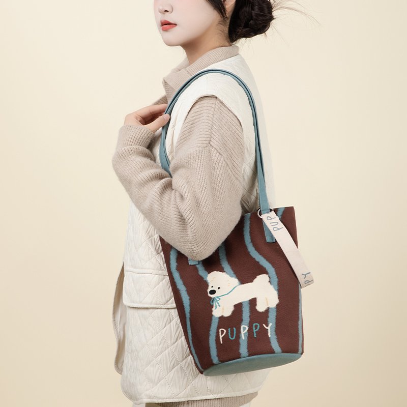 弘娜原创手绘小狗秋冬百搭通勤包包休闲大容量单肩斜挎水桶包女AC