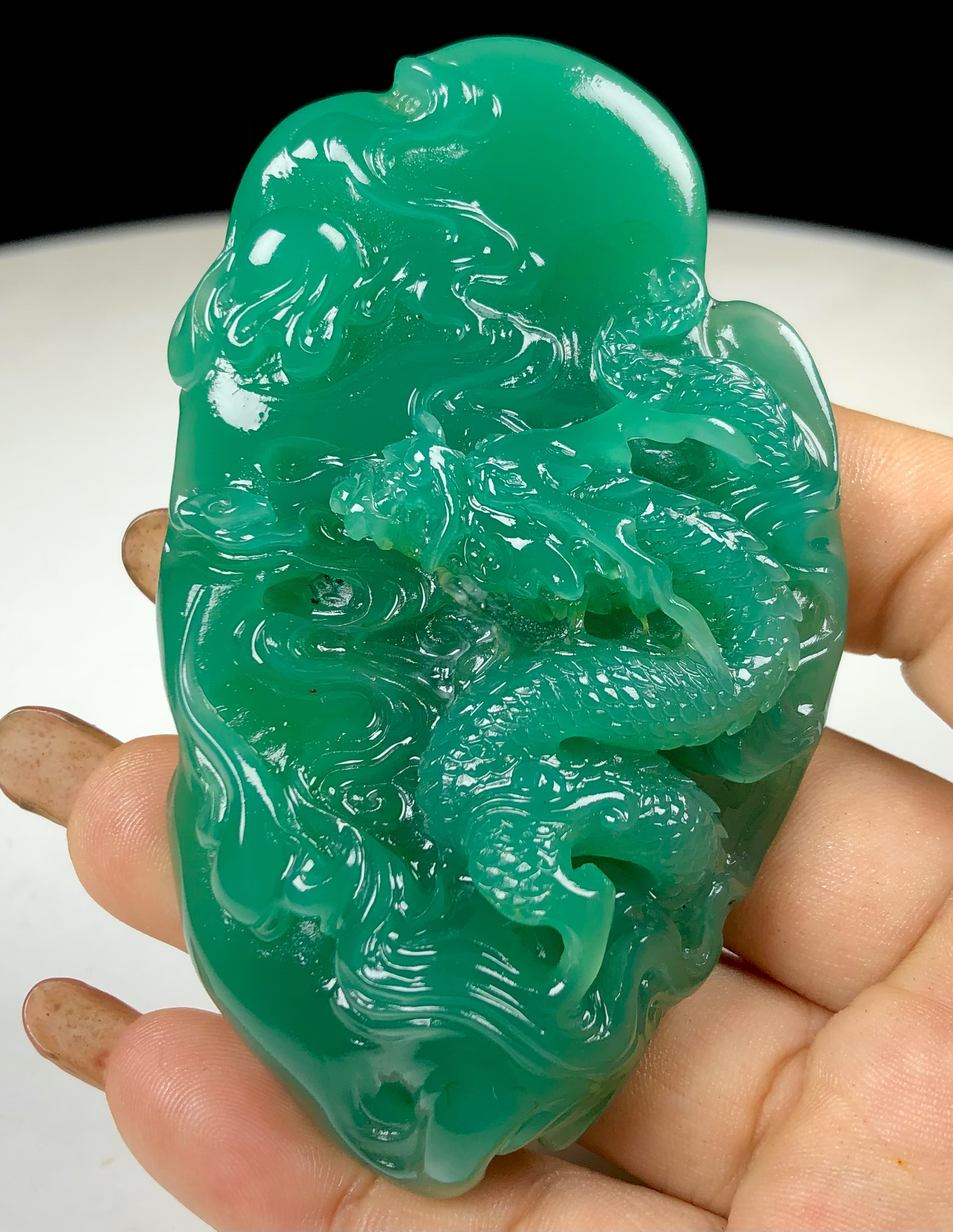雅安绿手把件 重93.3克 尺寸8.3/5.1/2.3cm