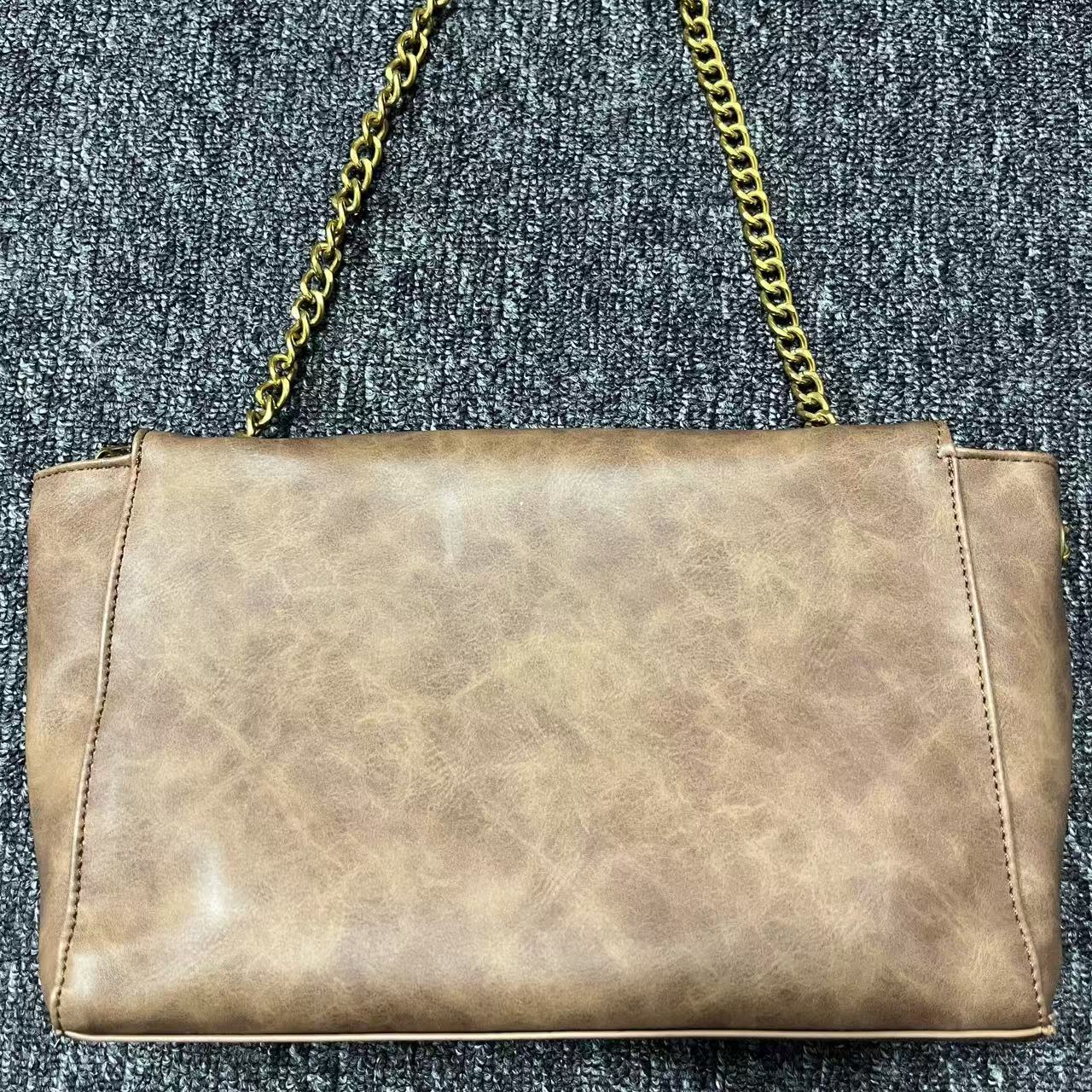 姝宴真皮女包棕黑-0109