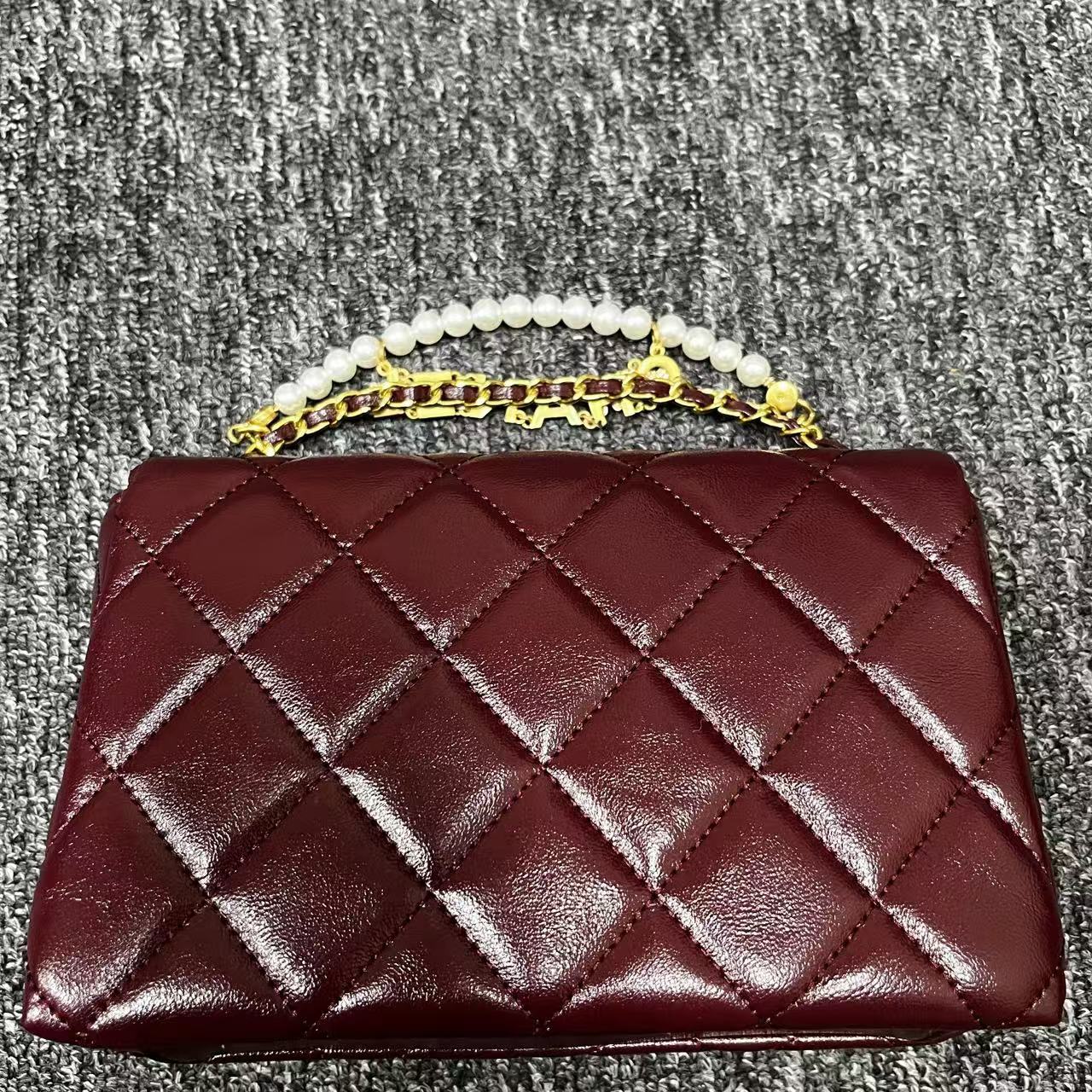 姝宴真皮女包珍珠字红色