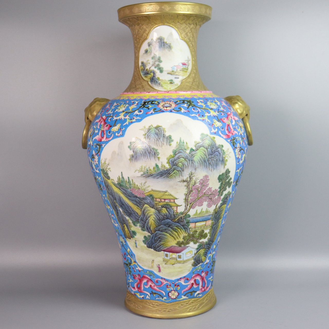 金地雕刻粉彩开窗山水双耳瓶 