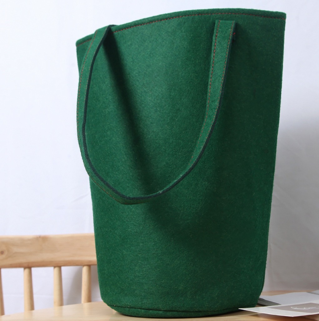 一个的价格绿色毛毡水桶包 有压痕 有小孔眼 单肩包 手提包 时尚