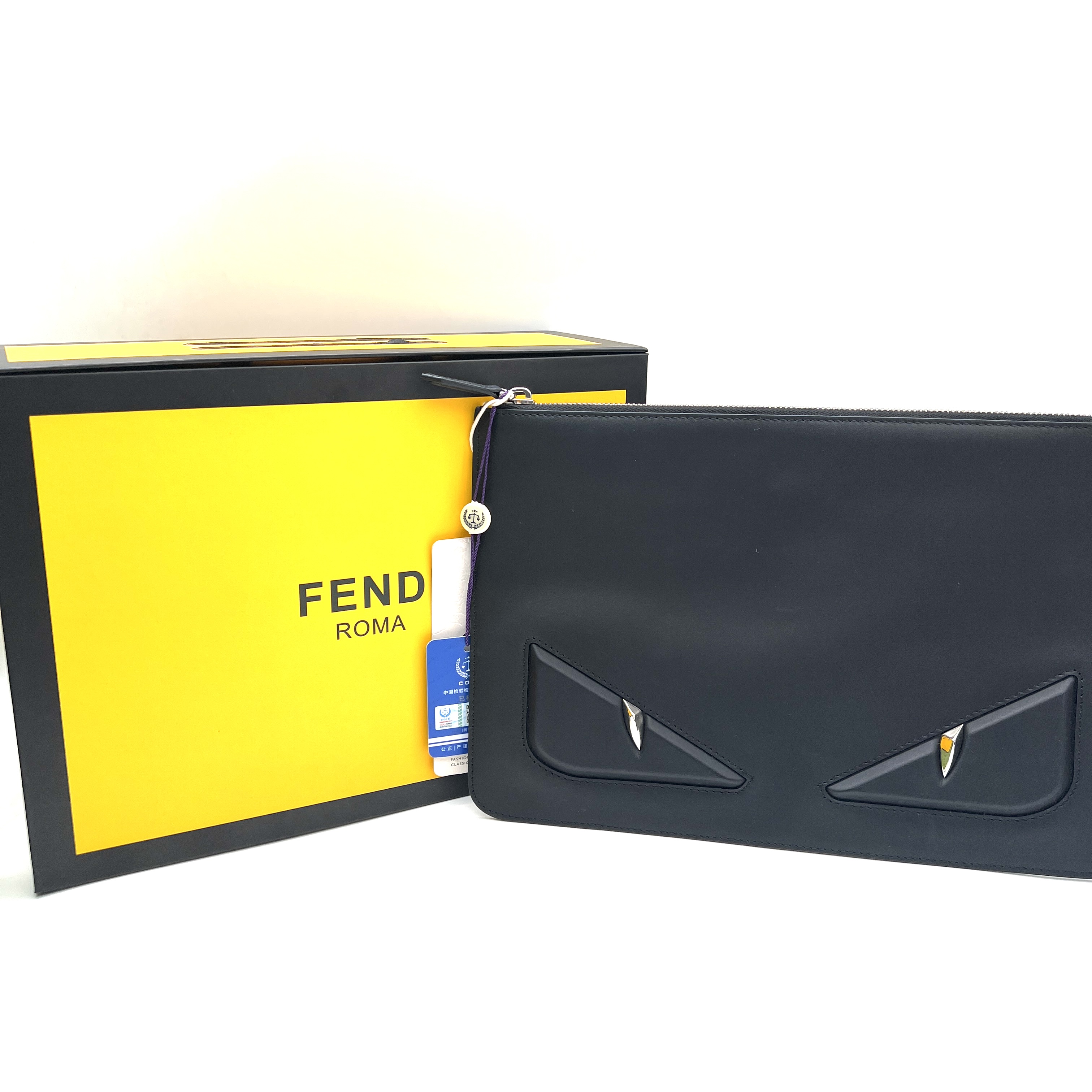 95新 FENDI/芬迪 小怪兽手拿包/M11/  赠钥匙扣