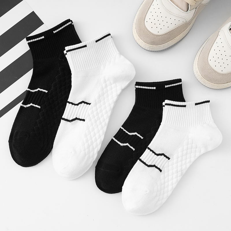 男女款春夏透气情侣百搭潮黑白学生运动夏季按摩底低帮短筒潮薄款