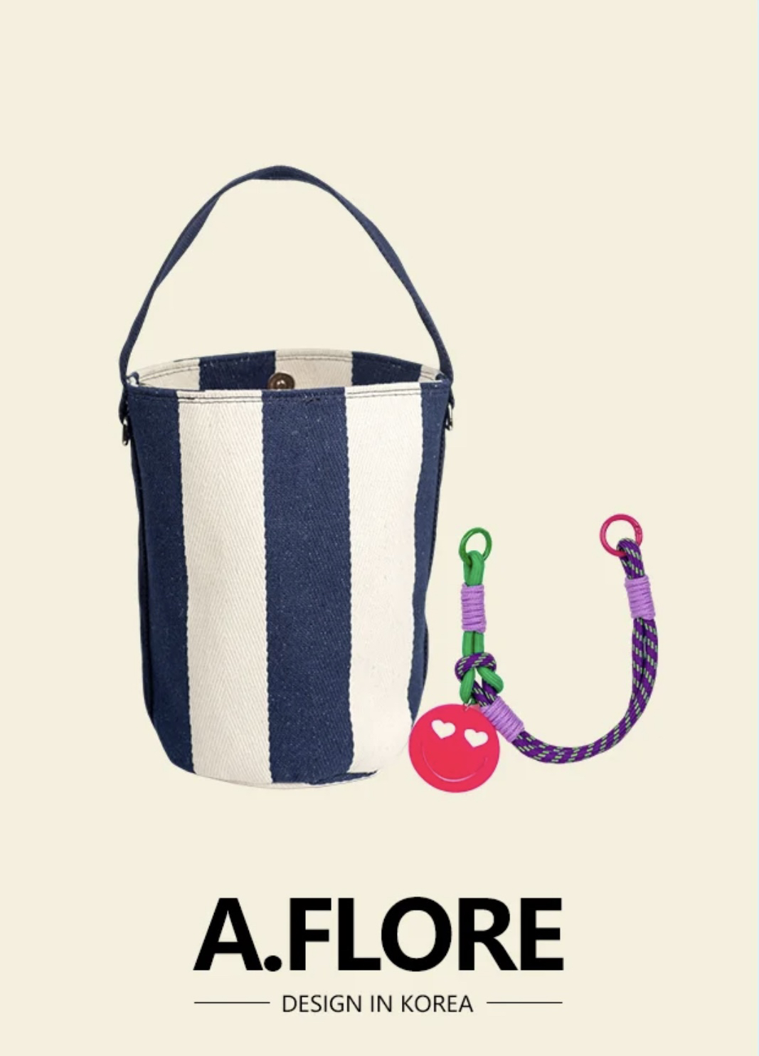 A.FLORE韩国原创小众简约条纹帆布水桶包笑脸挂饰手提单肩包包包