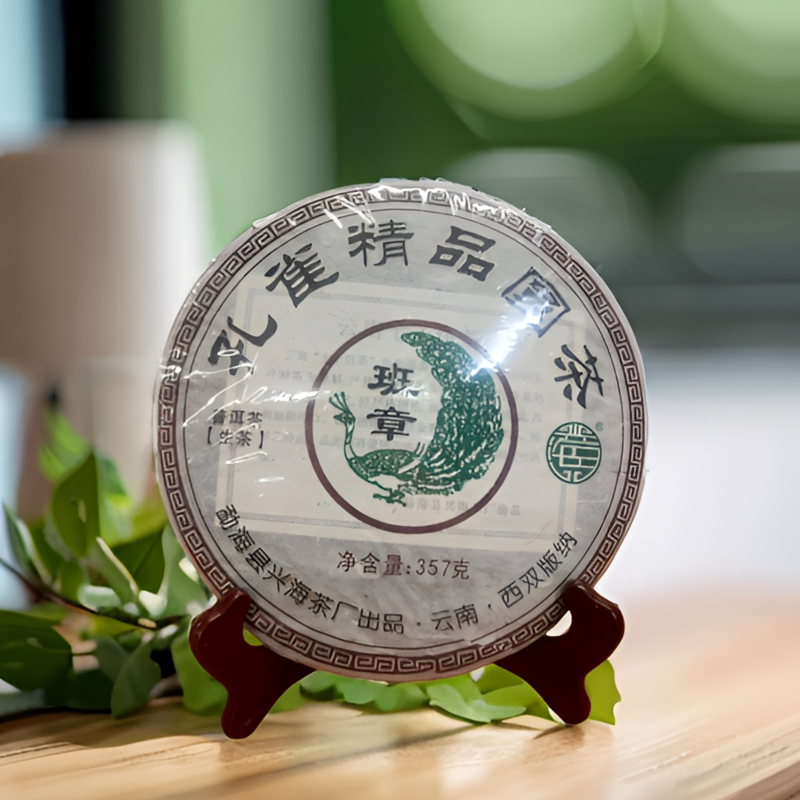 2011年XH孔雀班章精品圆茶357g/饼干仓高香云南普洱生普洱茶