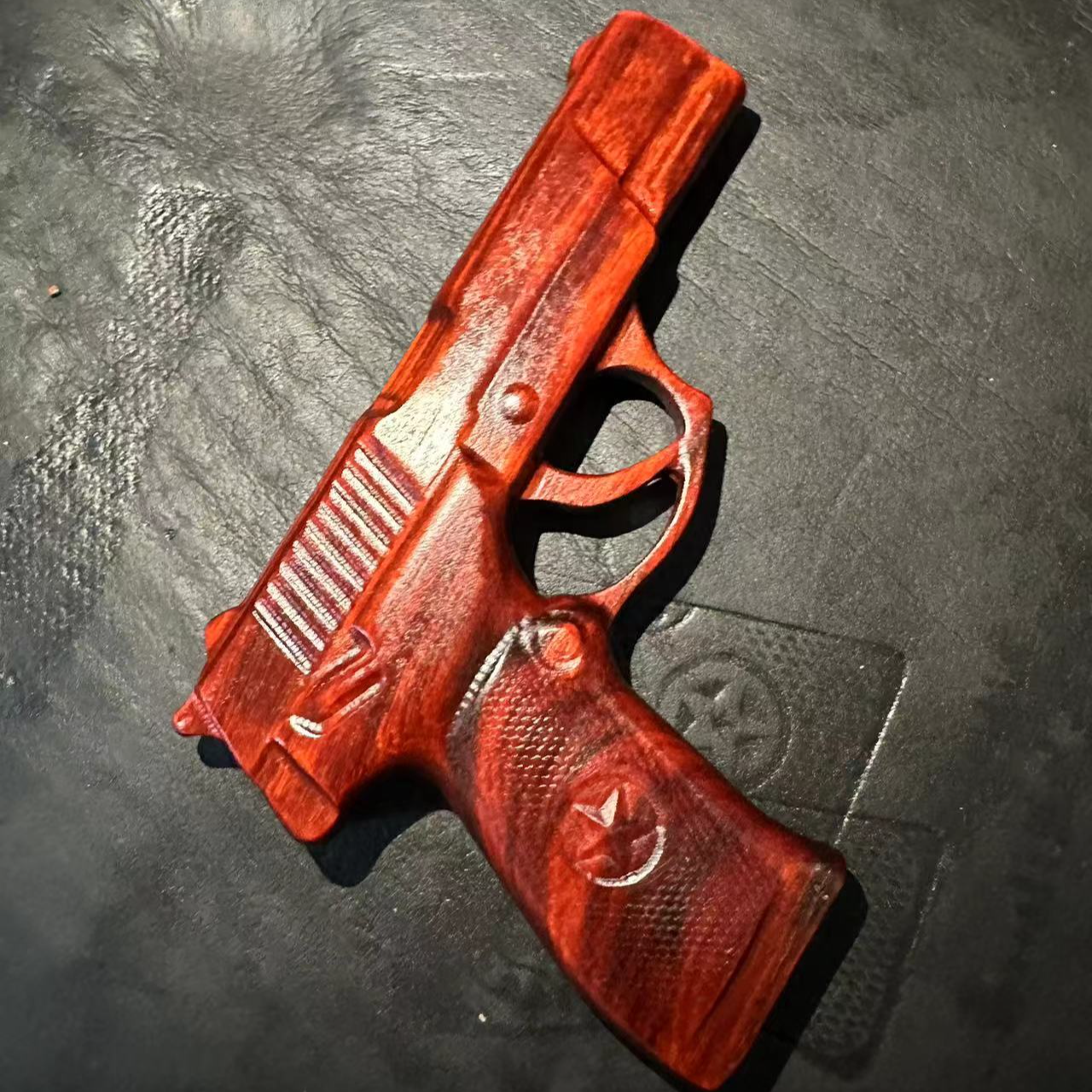 犀牛角紫檀92式掌中宝手把件