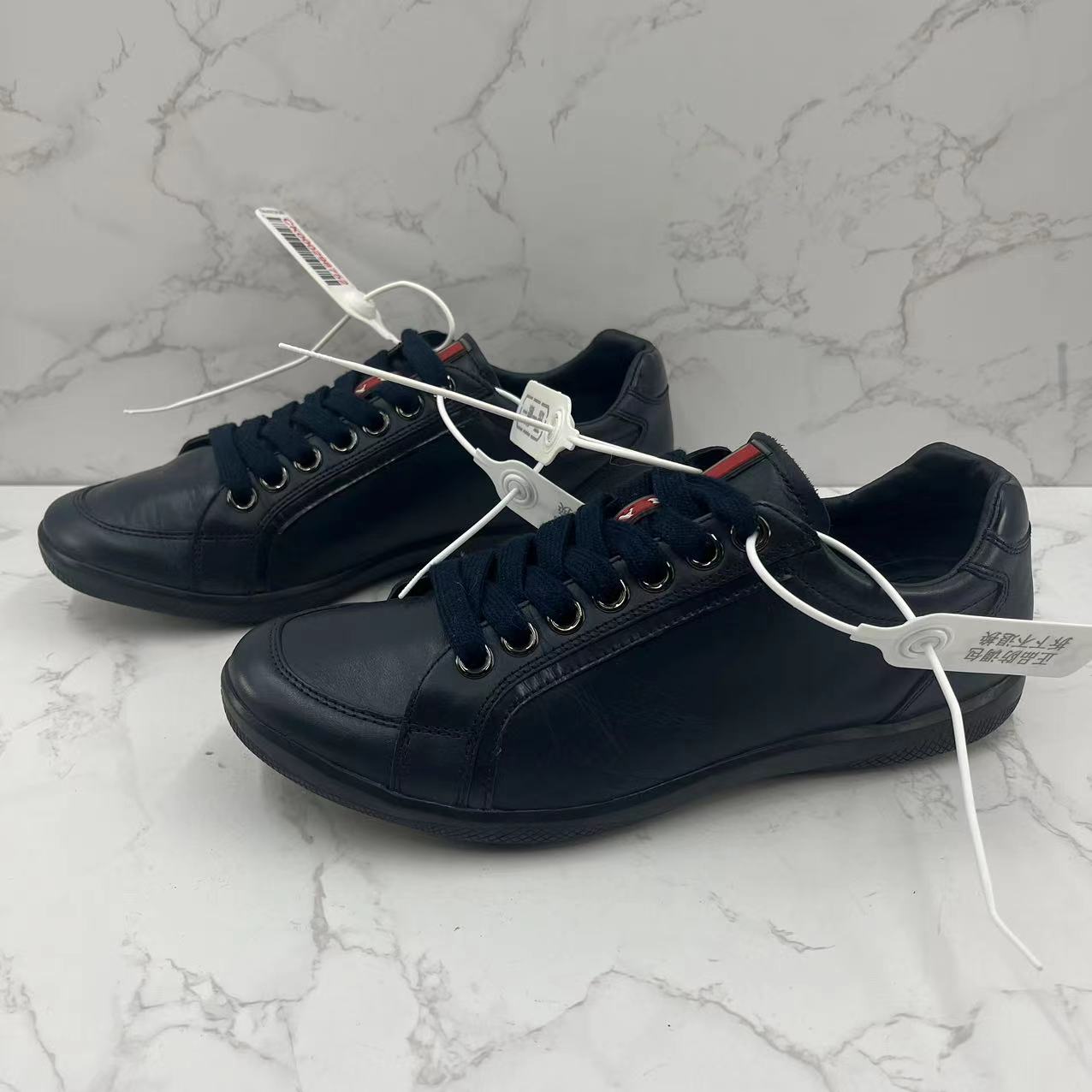 [聚星折扣]Prada/普拉达二手男士黑色皮质休闲时尚低帮板鞋39.5码