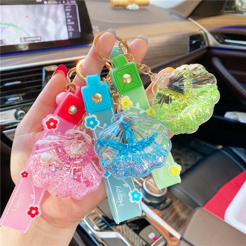 网红创意精致海星贝壳流沙漂浮瓶钥匙扣小挂件少女心入油背包C23