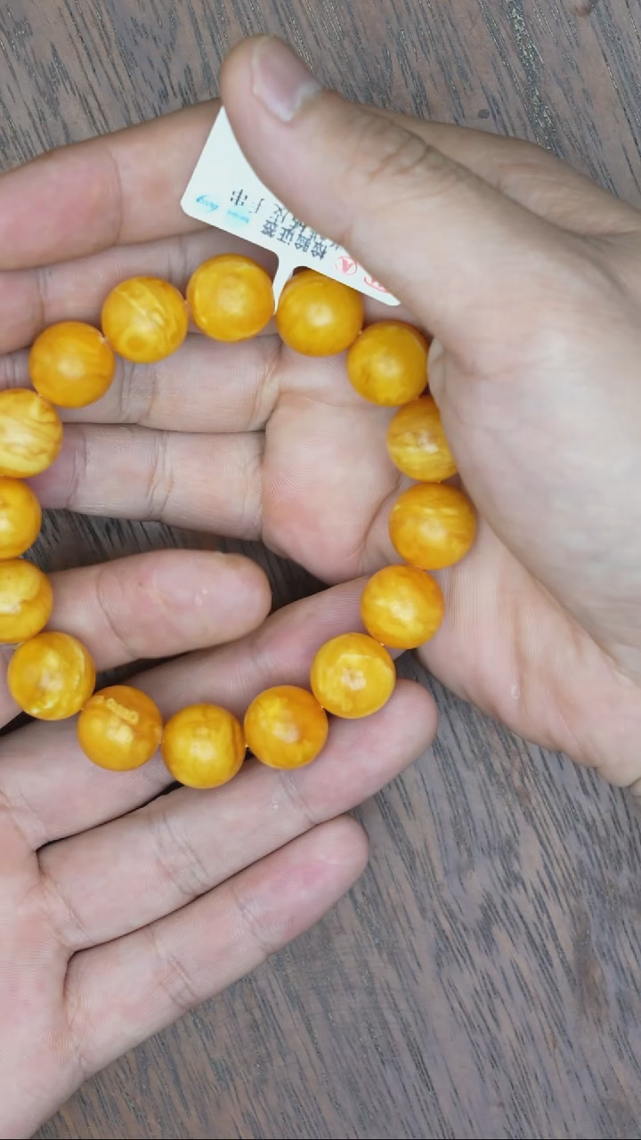【闪购商品】琥珀裸石未镶嵌老蜡橘皮圆珠手串