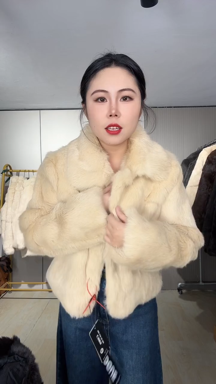 “****”199中长款黑色挽袖