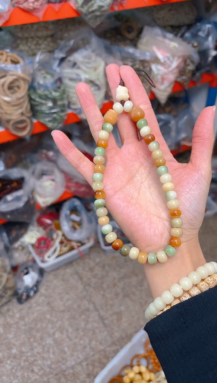 吊坠菩提根/象牙果长款手机链一条