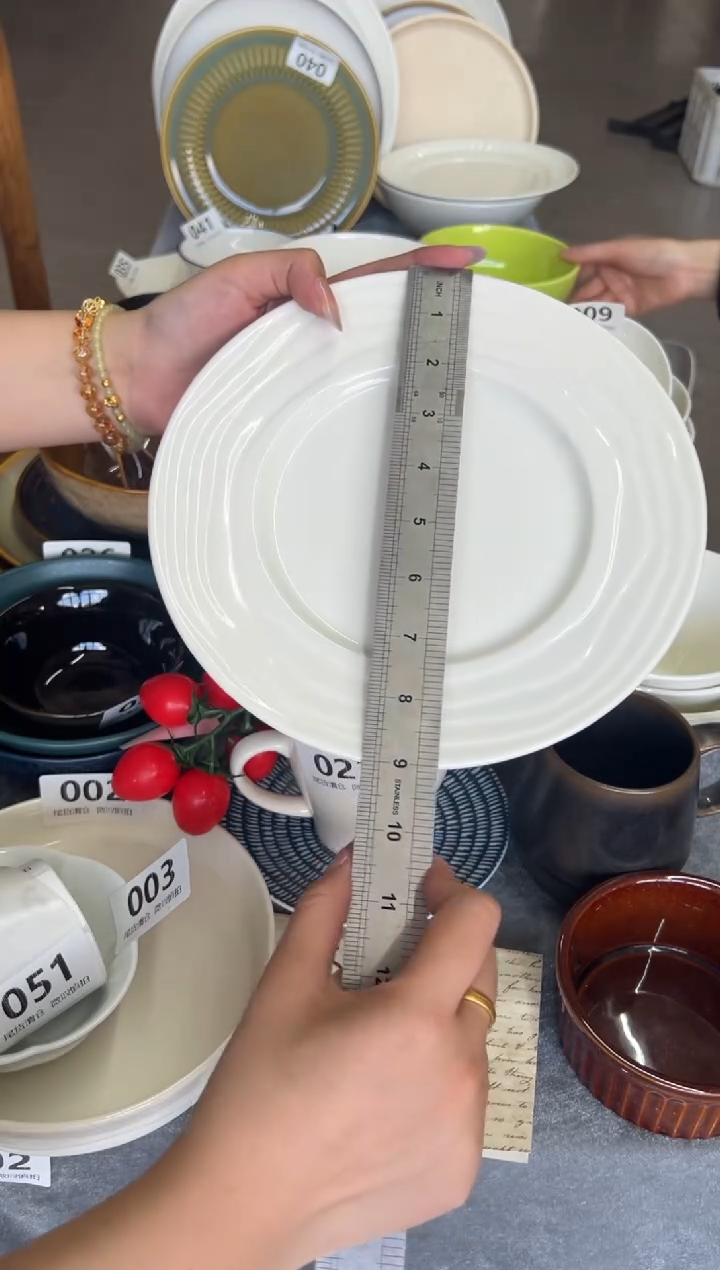 新骨瓷051 瑕疵暖白顶峰9寸平盘